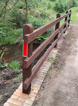 wood highway railing