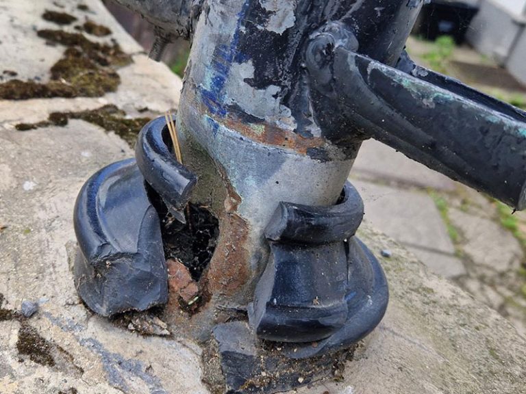 Damaged iron footing