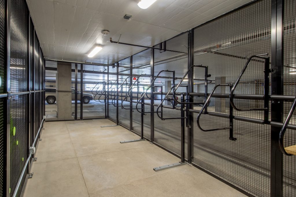 Secure bike storage in a parking garage.